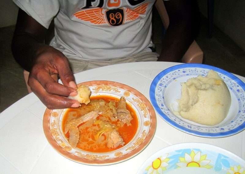 Eating fufu - Alphanso Afro-Caribbean Foods